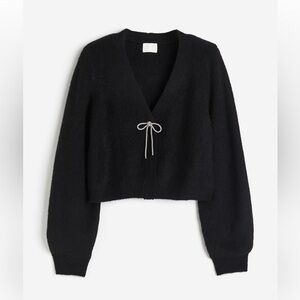 Black knit cardigan white diamond bow